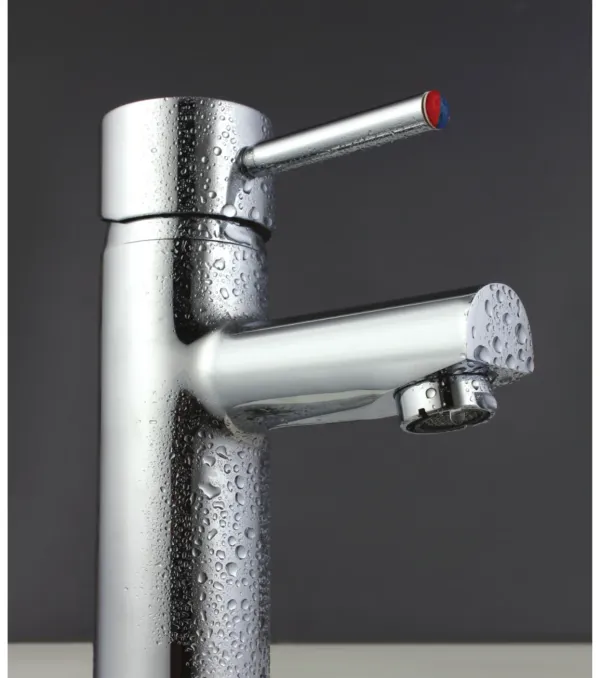 Fiesta single lever basin mixer in chrome with water droplets beaded on the spout and body